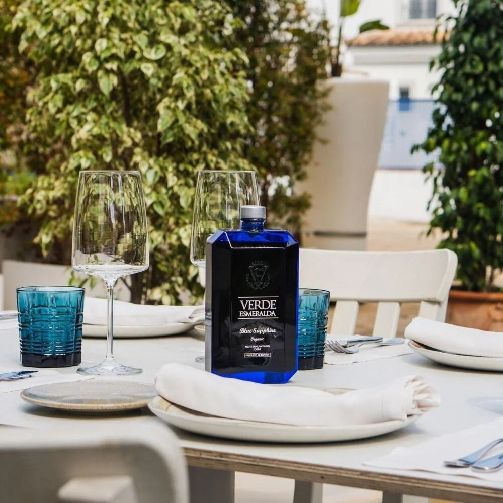 Elegant bottle of Spanish olive oil reflecting Mediterranean sun